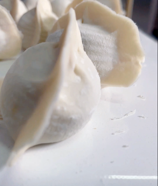 速凍餃子機(jī)做出來的餃子 速凍餃子機(jī)做出來的餃子